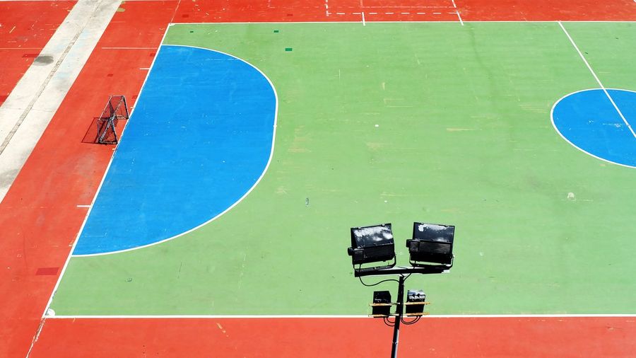 High angle view of basketball hoop against blue wall
