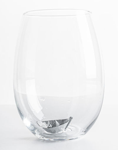 Close-up of water glass on table