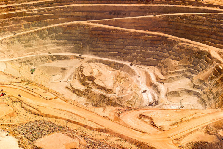 Close-up aerial view of the pit of a copper mine at the altiplano of the atacama desert in chile