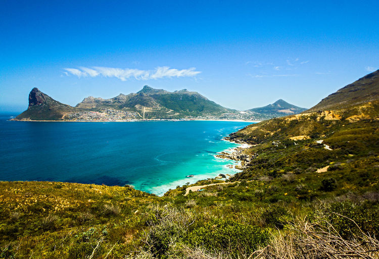 Panoramic seascape view of hout bay beach and hills from cape of good hope, cape town, south africa