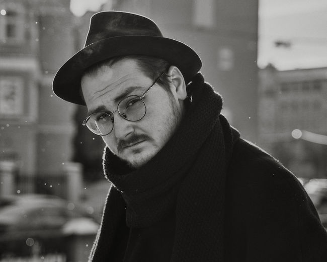 Portrait of young man wearing hat