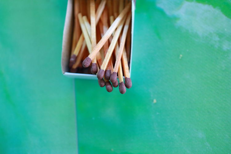 High angle view of matchsticks on table