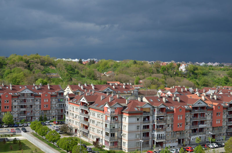 Stormy sky above a quarter of residential buildings