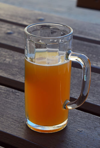 Beer glass on wooden table