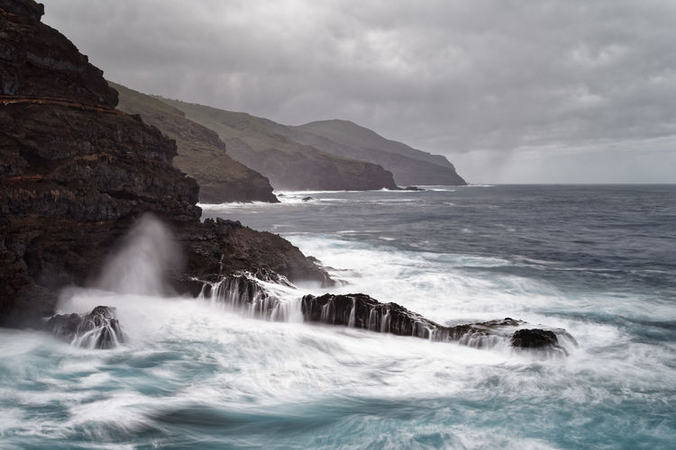 Strong surf on a rocky coast in stormy weather, spain, canary islands, la palma