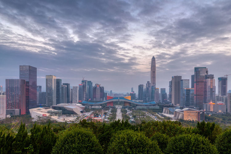 Panoramic view of city buildings against sky