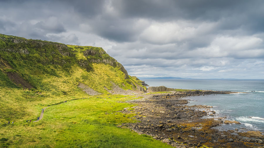 Panoramic view on main hexagonal rock formation, basalt columns in giants causeway, northern ireland