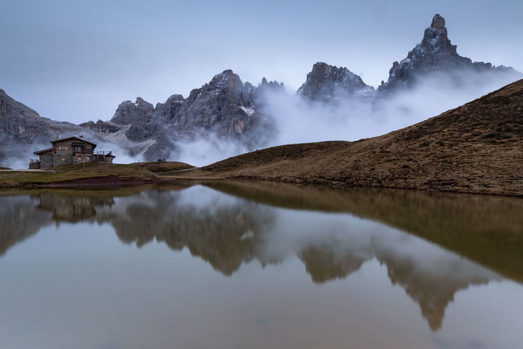 Panoramic view of lake and mountains against sky in dolomites mountains 