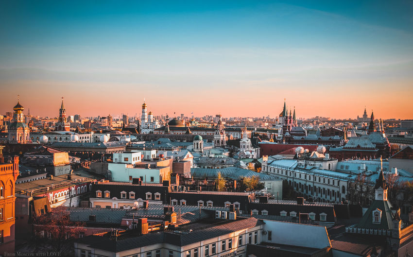 Cityscape against sky during sunset