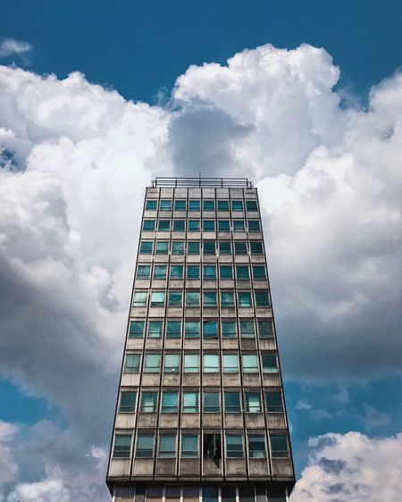 Low angle view of modern building against sky