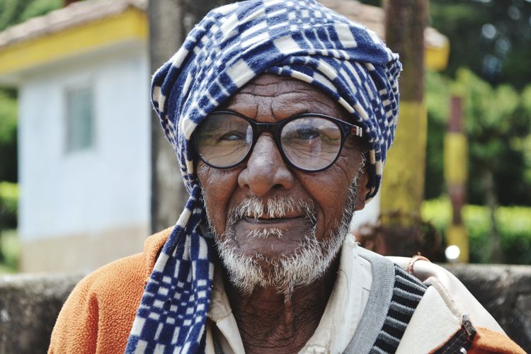 Portrait of senior man wearing turban and eyeglasses