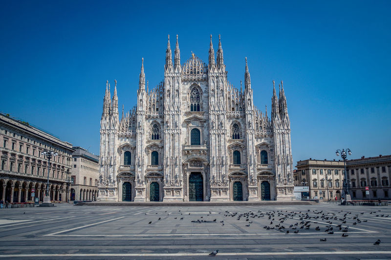 Facade of church against clear blue sky