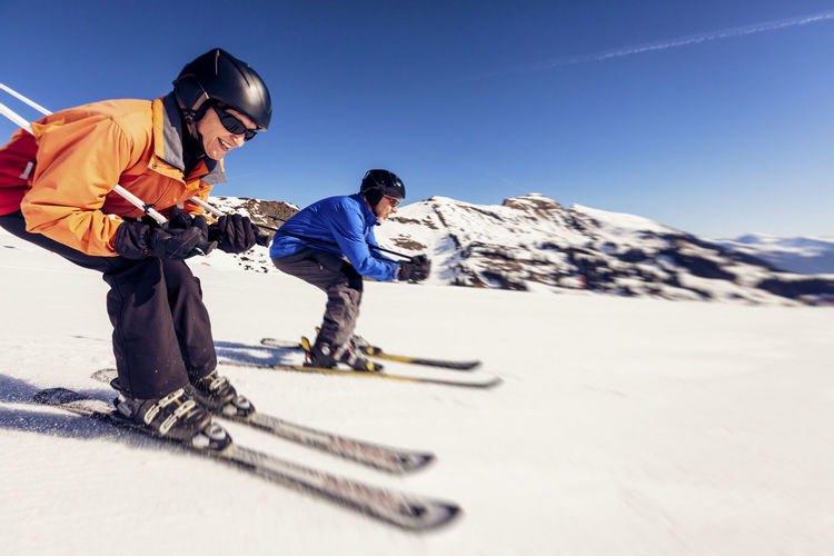Austria, damuels, woman skiing in winter landscape