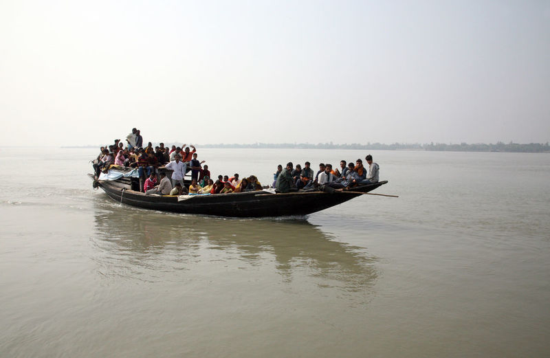 People on boat in sea