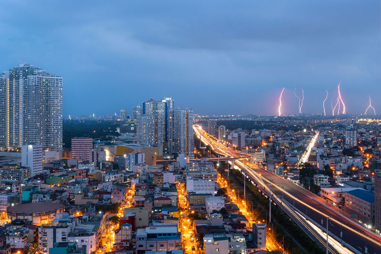 Manila city during dusk with thunderstorms