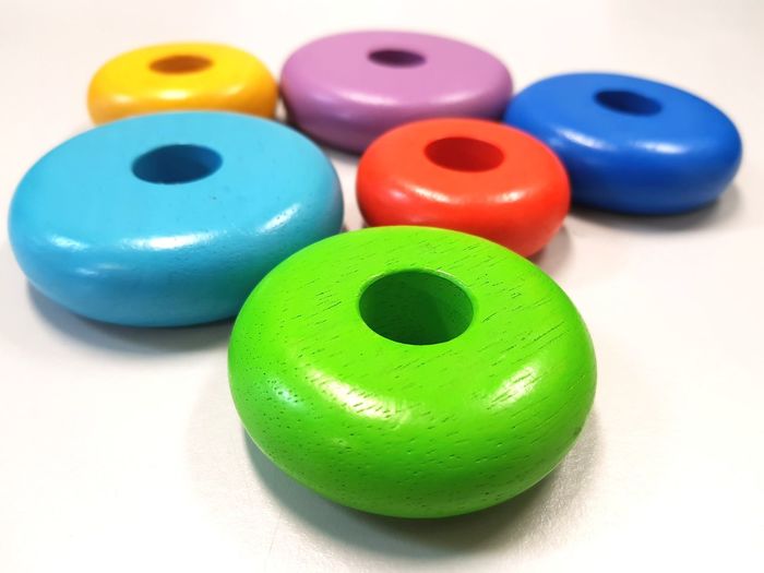 Close-up of multi colored toys on table