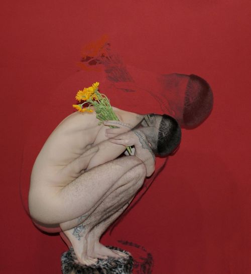 Digital composite image of naked man crouching with flowers by red background