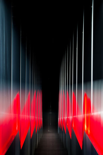 ILLUMINATED RED LIGHTS ON FLOOR