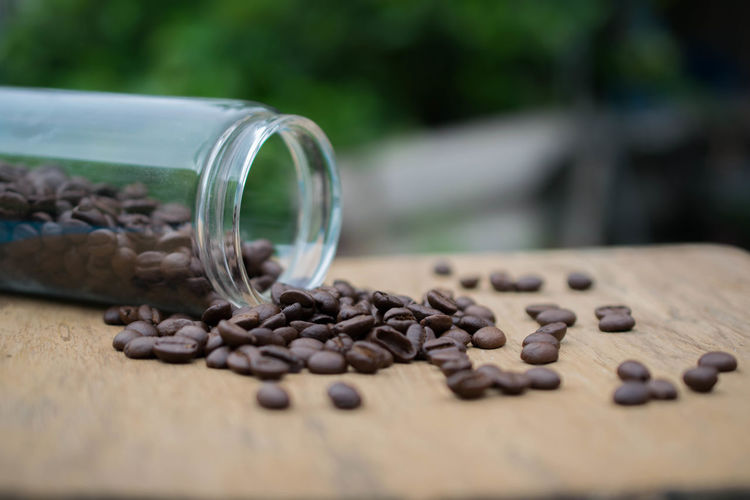 Close-up of coffee beans on table