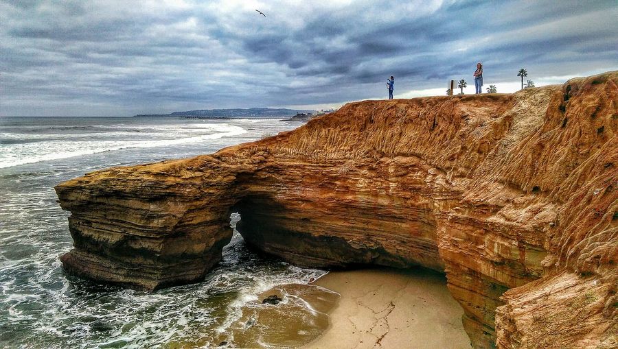 Tourists on cliff