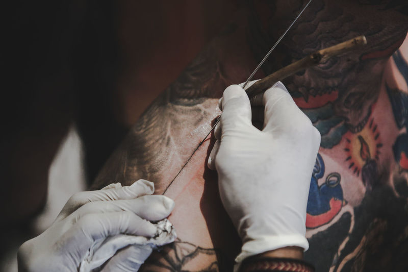 Tattoo traditional , hand poked
