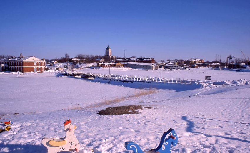 View of buildings on snow covered land