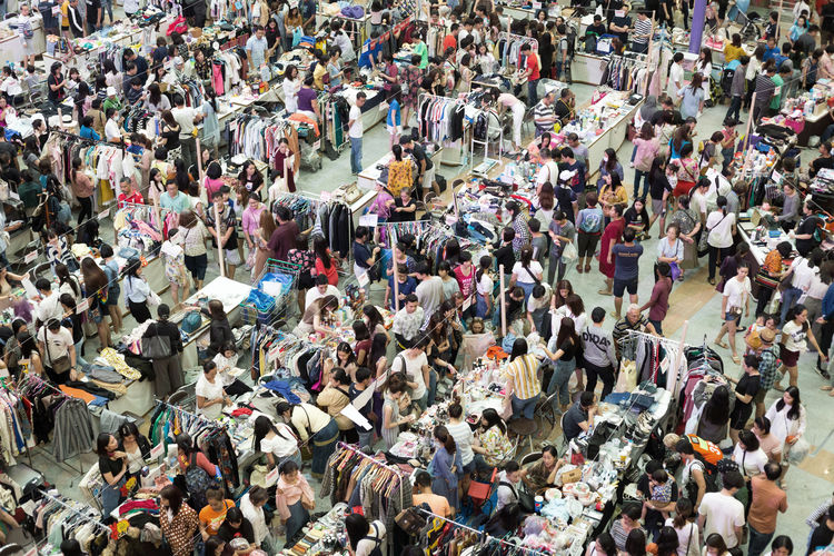 High angle view of people on street market in city