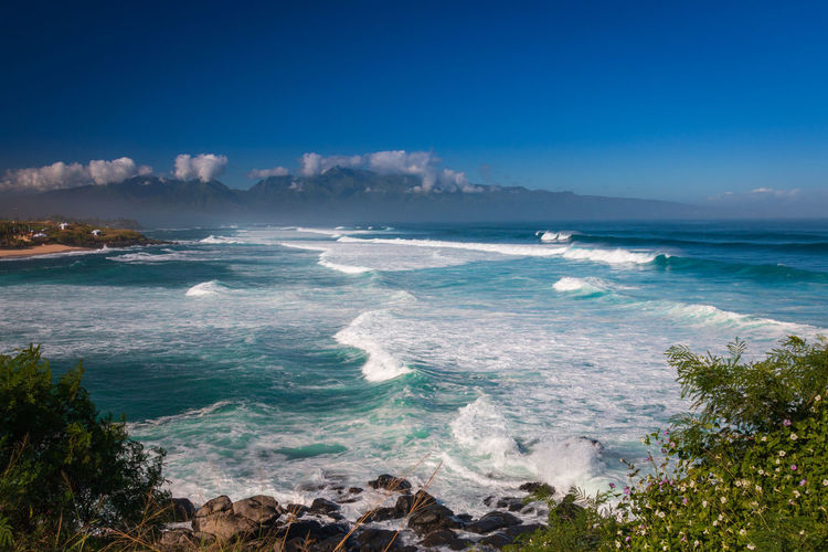 Scenic view of  hookipa beach park on the hawaiian island of maui, usa against blue sky