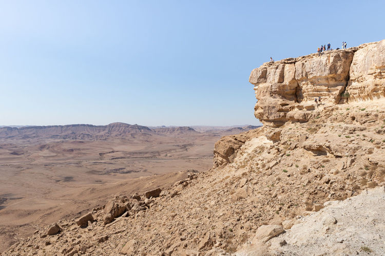 Rock formations in desert against sky