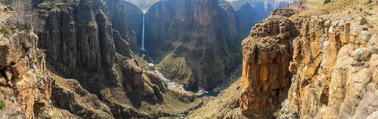 Panoramic view of rocky mountains and maletsunyane waterfall, semonkong, lesotho, africa
