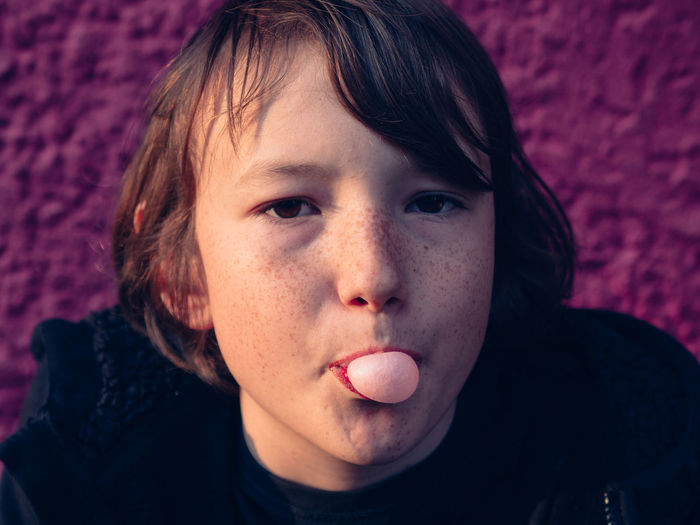 Portrait of boy with bubble gum