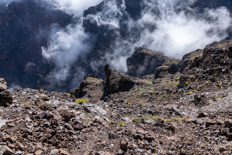 Above the clouds, volcanic landscape at roque de los muchachos, the highest point on la palma island