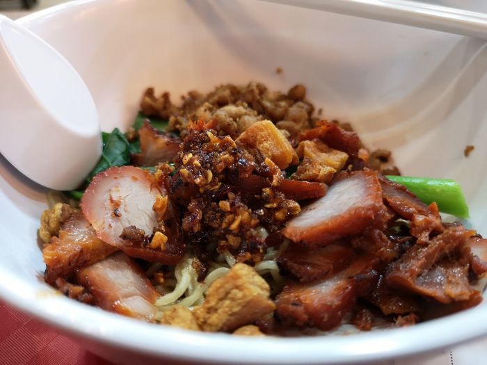 High angle view of singaporean minch meat noodles served in plate