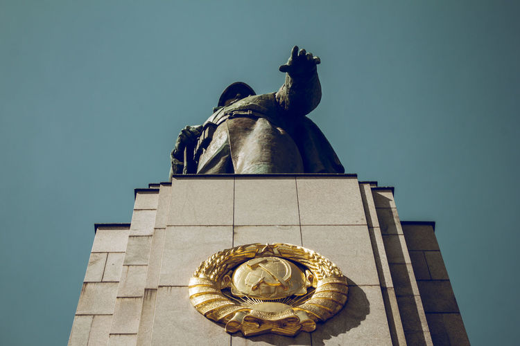 Low angle view of statue against clear sky at soviet war memorial