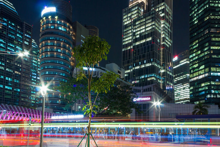 Illuminated buildings in city at night