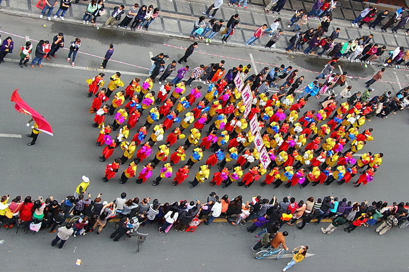 High angle view of chinese new year parade on street in city