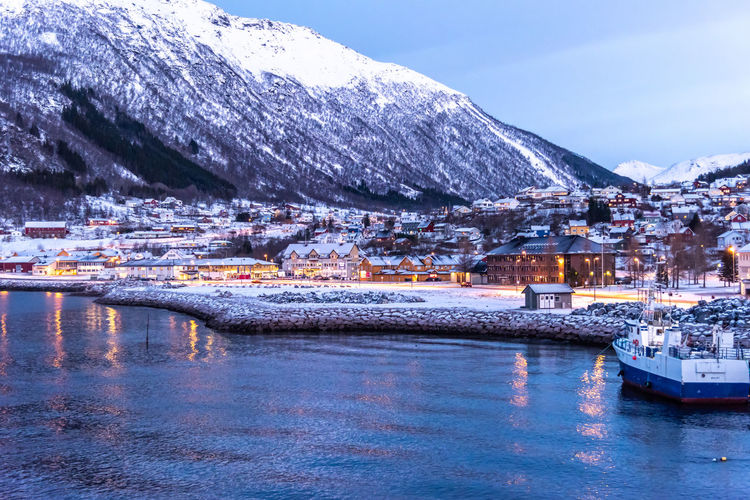 Scenic view of snowcapped mountains against sky during winter