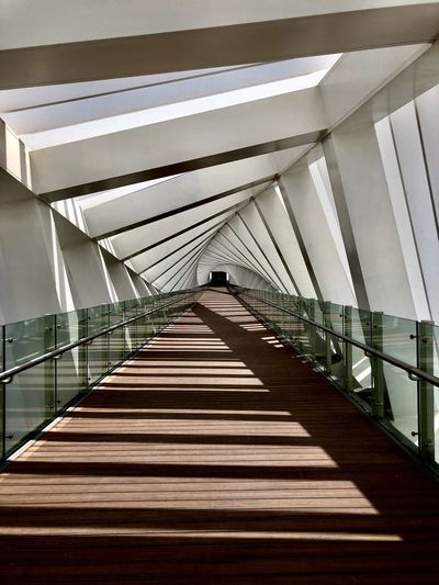 Low angle view of twisting bridge 