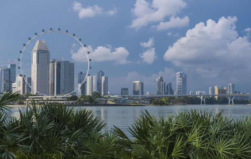 Ferris wheel in singaore against blue sky