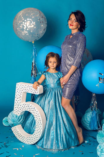 Mother and daughter are in the studio at the birthday party