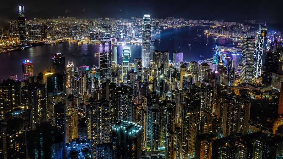 High angle view of illuminated cityscape at night