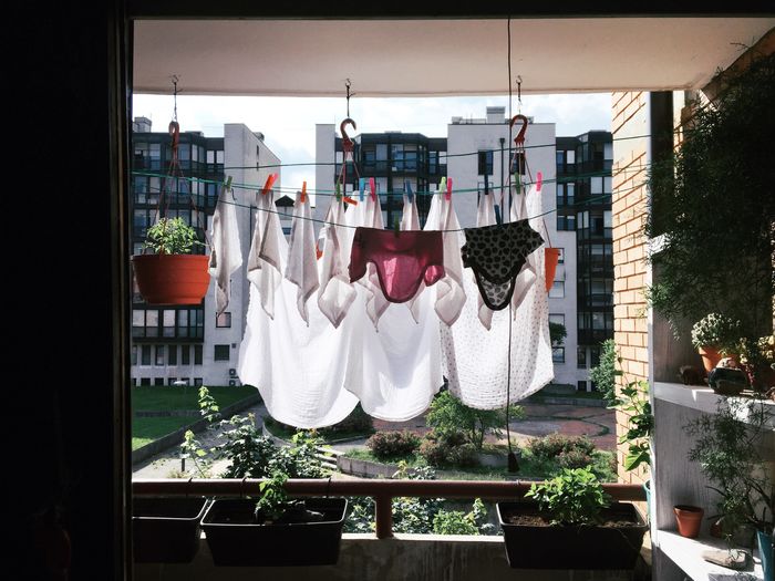 Clothes drying against built structure