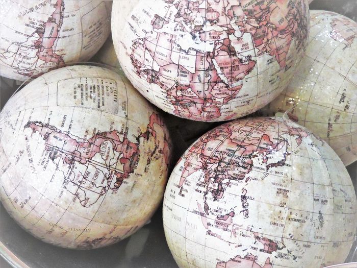 High angle view of damaged globes on table