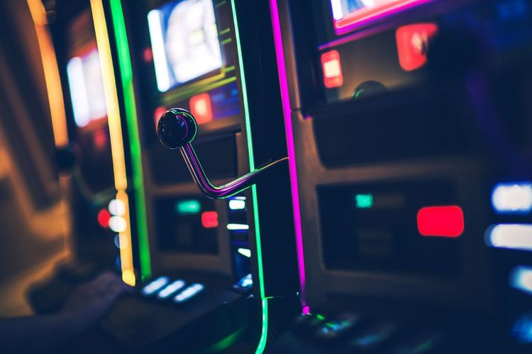 Close-up of illuminated slot machine
