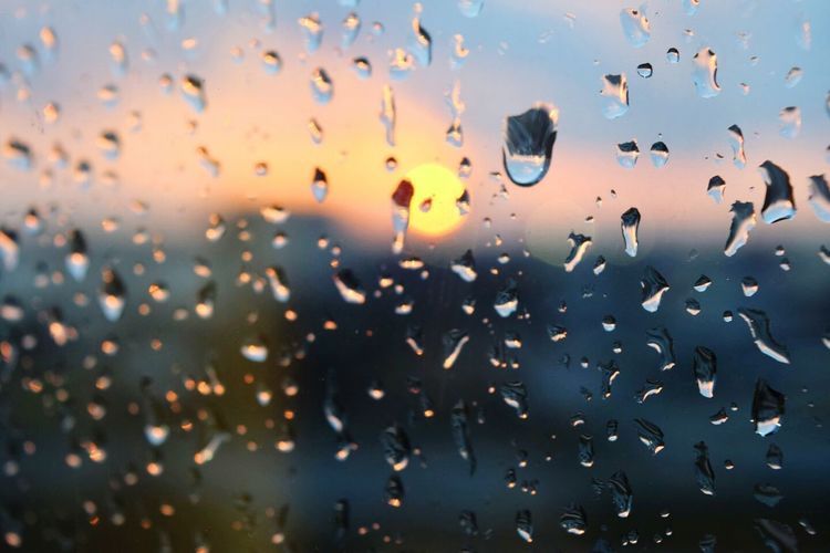 Full frame shot of wet glass during monsoon