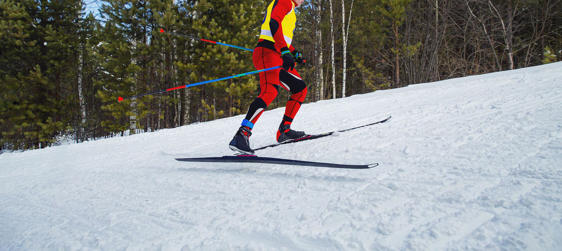 Man skiing on snow field