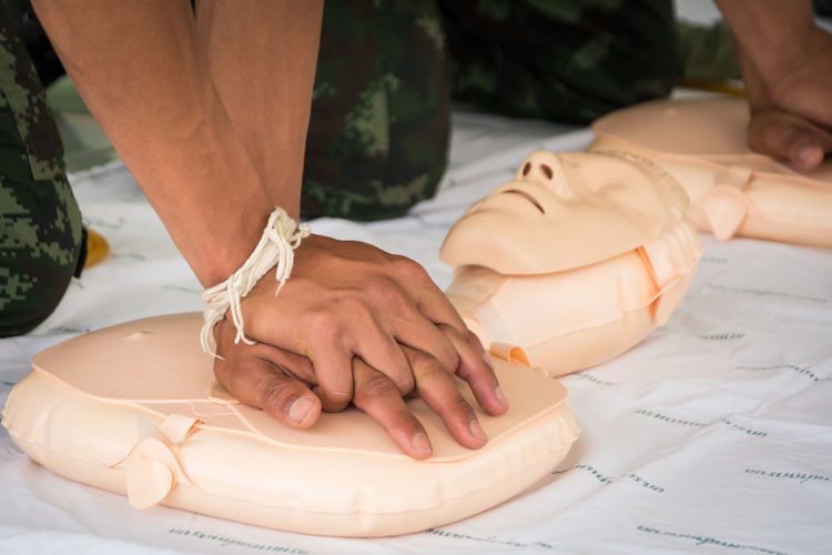 Chest compressions on cpr dummy