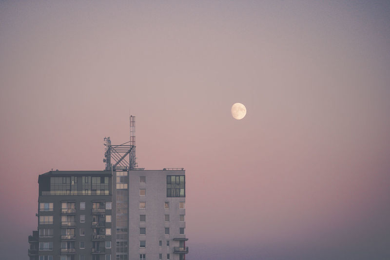 Low angle view of buildings against clear sky