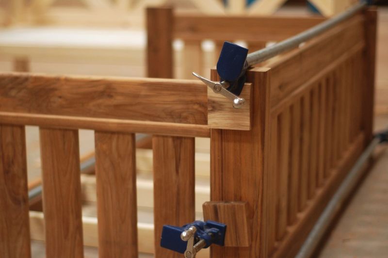 Close-up of clamps on wood furniture