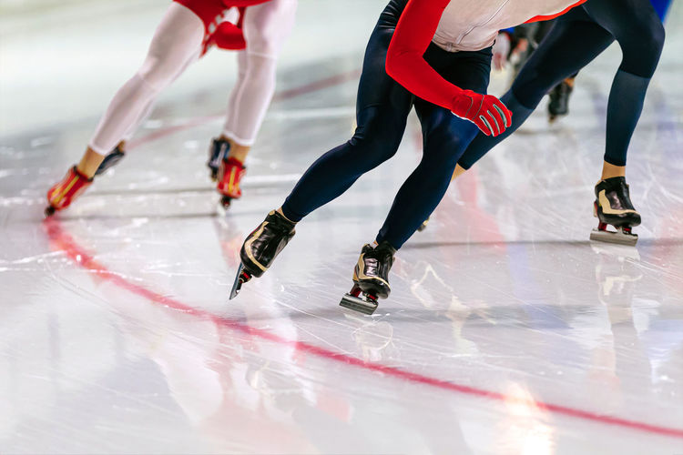 Legs group athletes skaters in speed skating